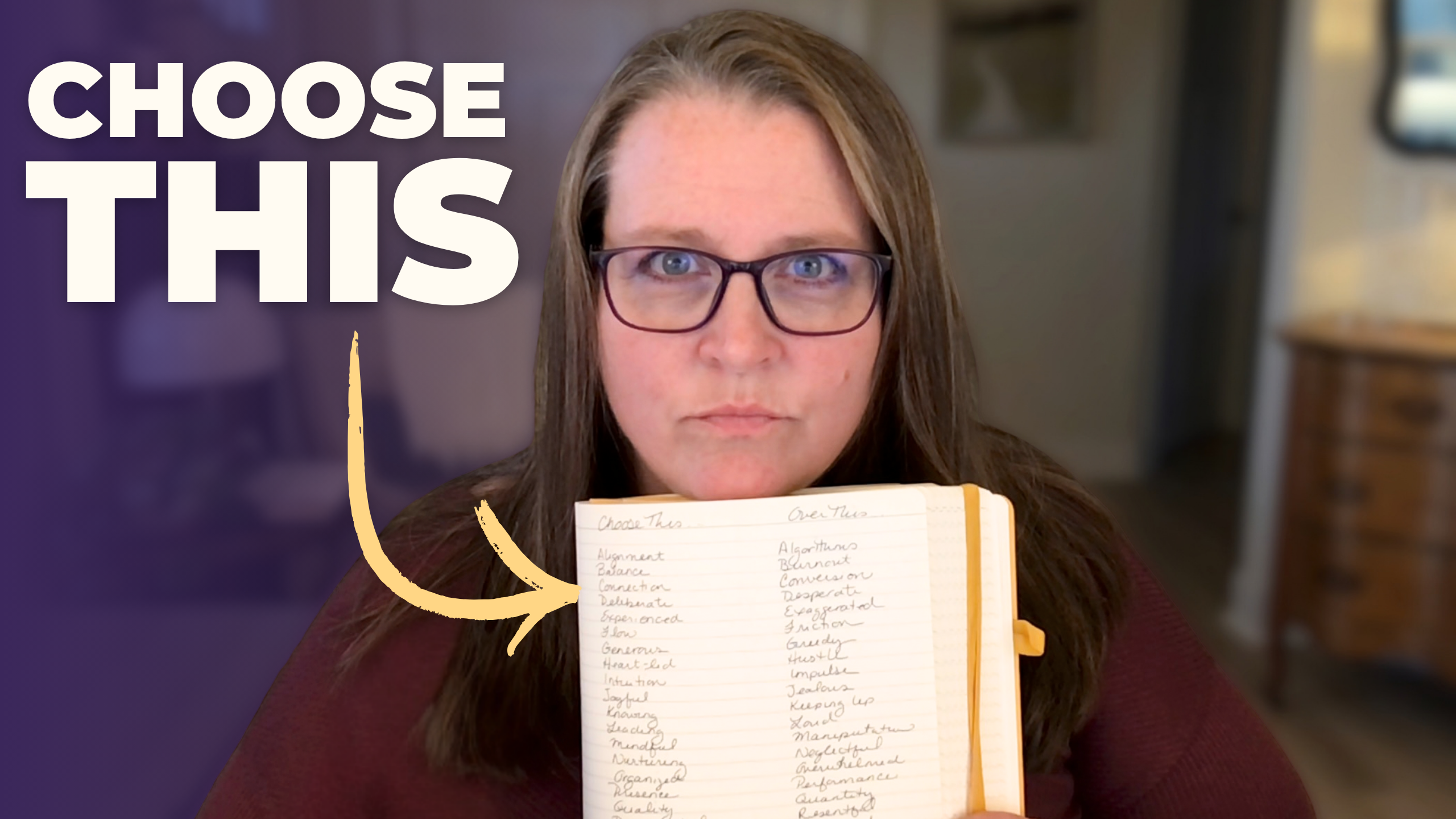 Heather Stephens holding her journal with her Choose This Over That list.